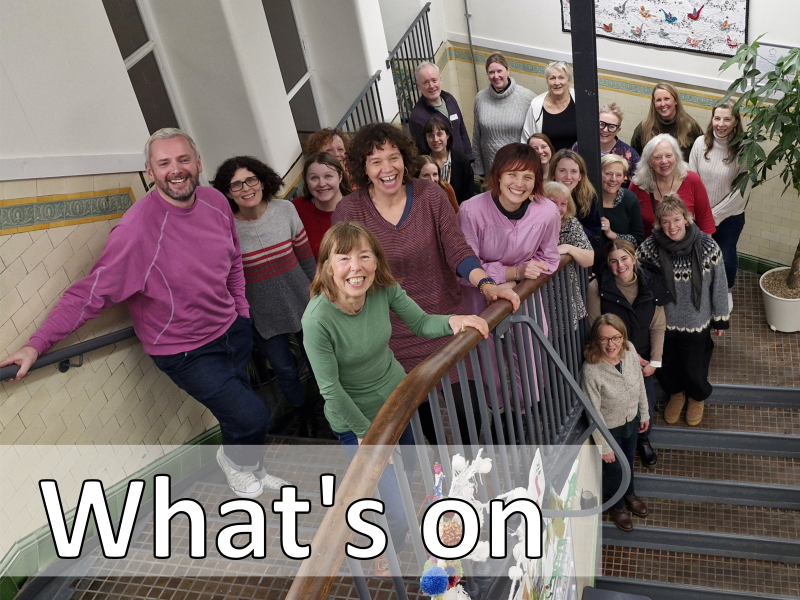 The Duncan Place Choir on the stairs smiling